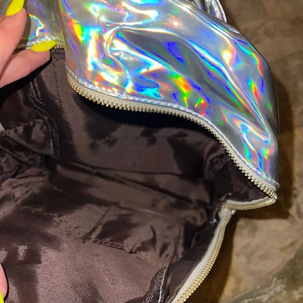 Broken zipper holographic backpack